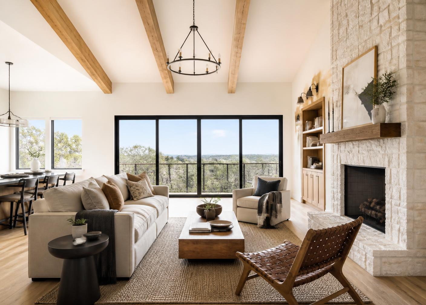 A vacant hill country home staged to bring warmth to tall volumes and draw attention to the view corridor.